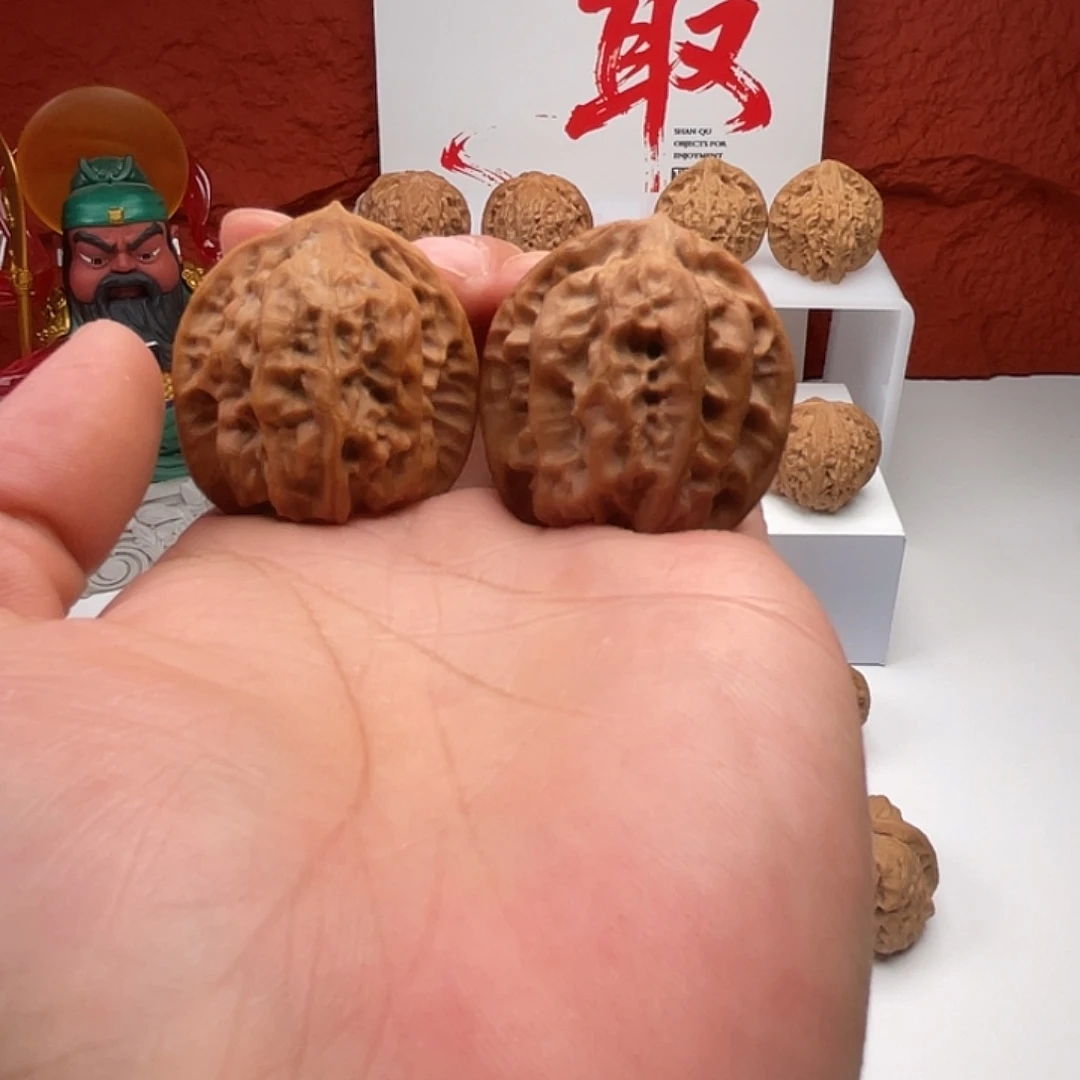 文玩核桃吊坠磐石