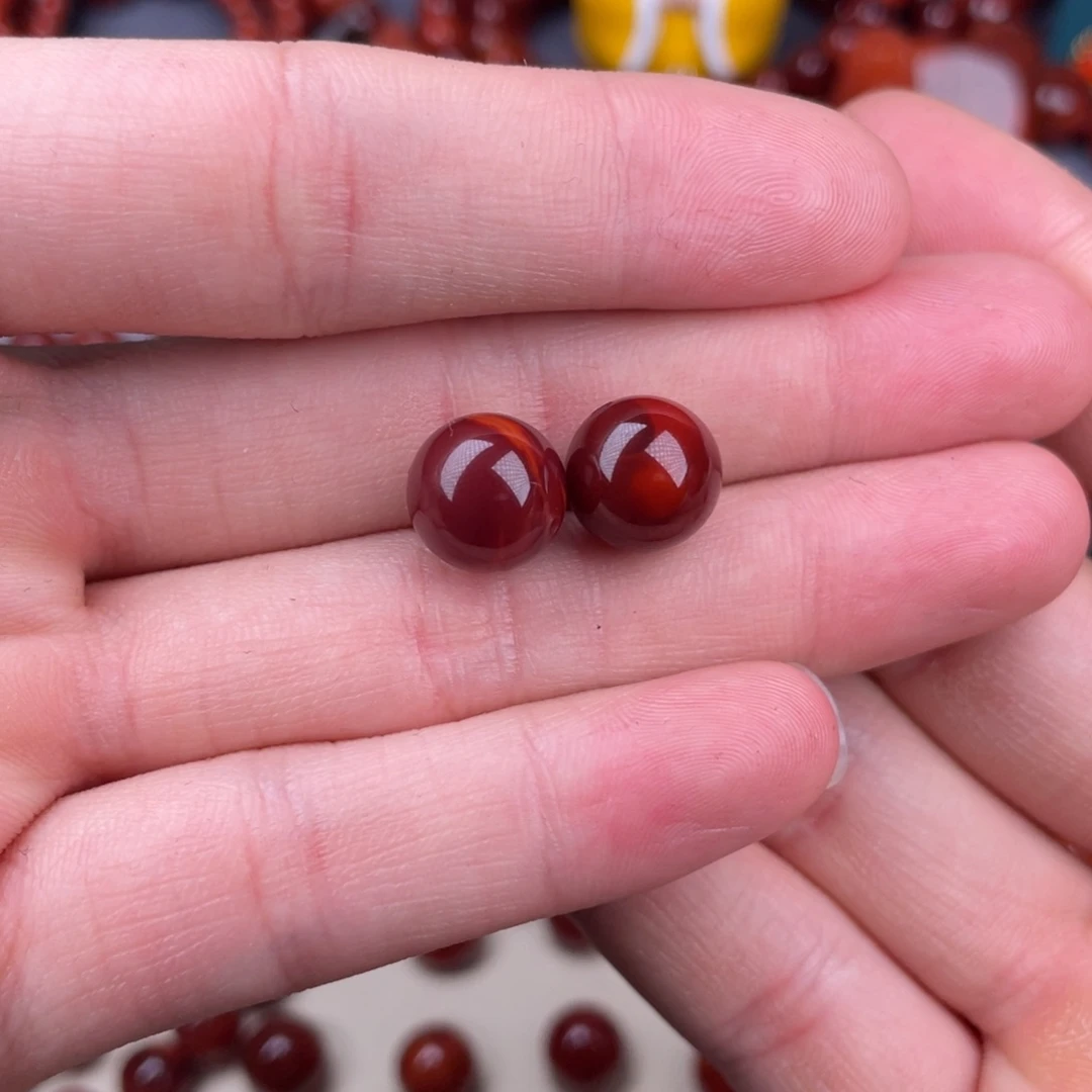 南红玛瑙未镶嵌其他10.7mm瓦西牛血红双色原矿对珠