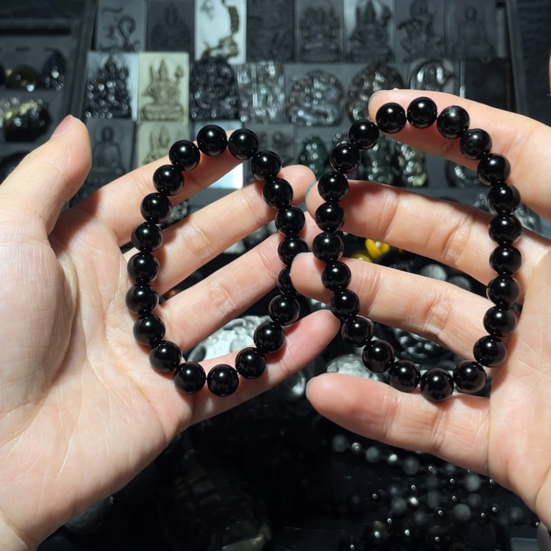 梓****黑曜岩未镶嵌珠宝奇石