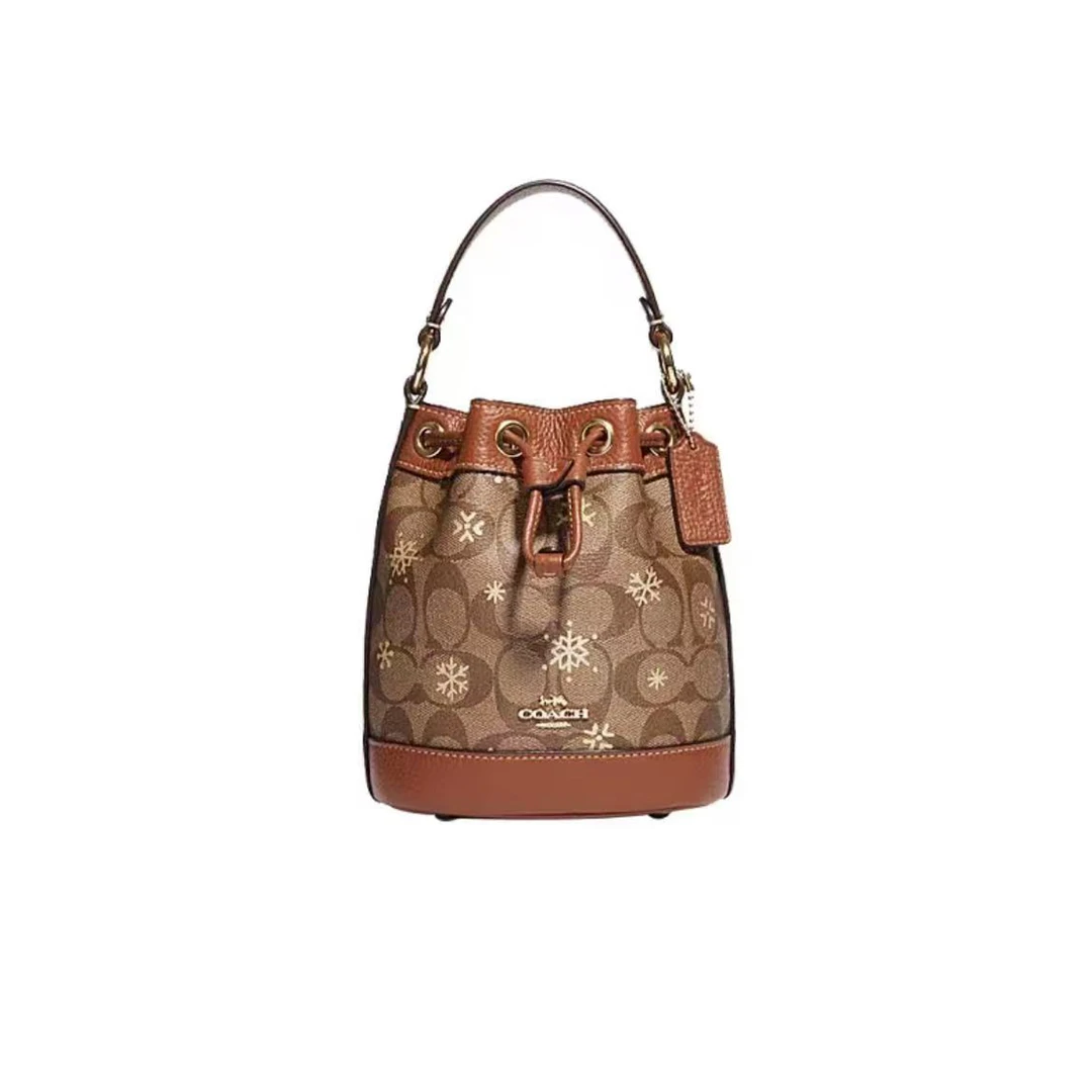 95新 COACH/蔻驰 焦糖色老花印花抽绳水桶包/A9568/15X17X10