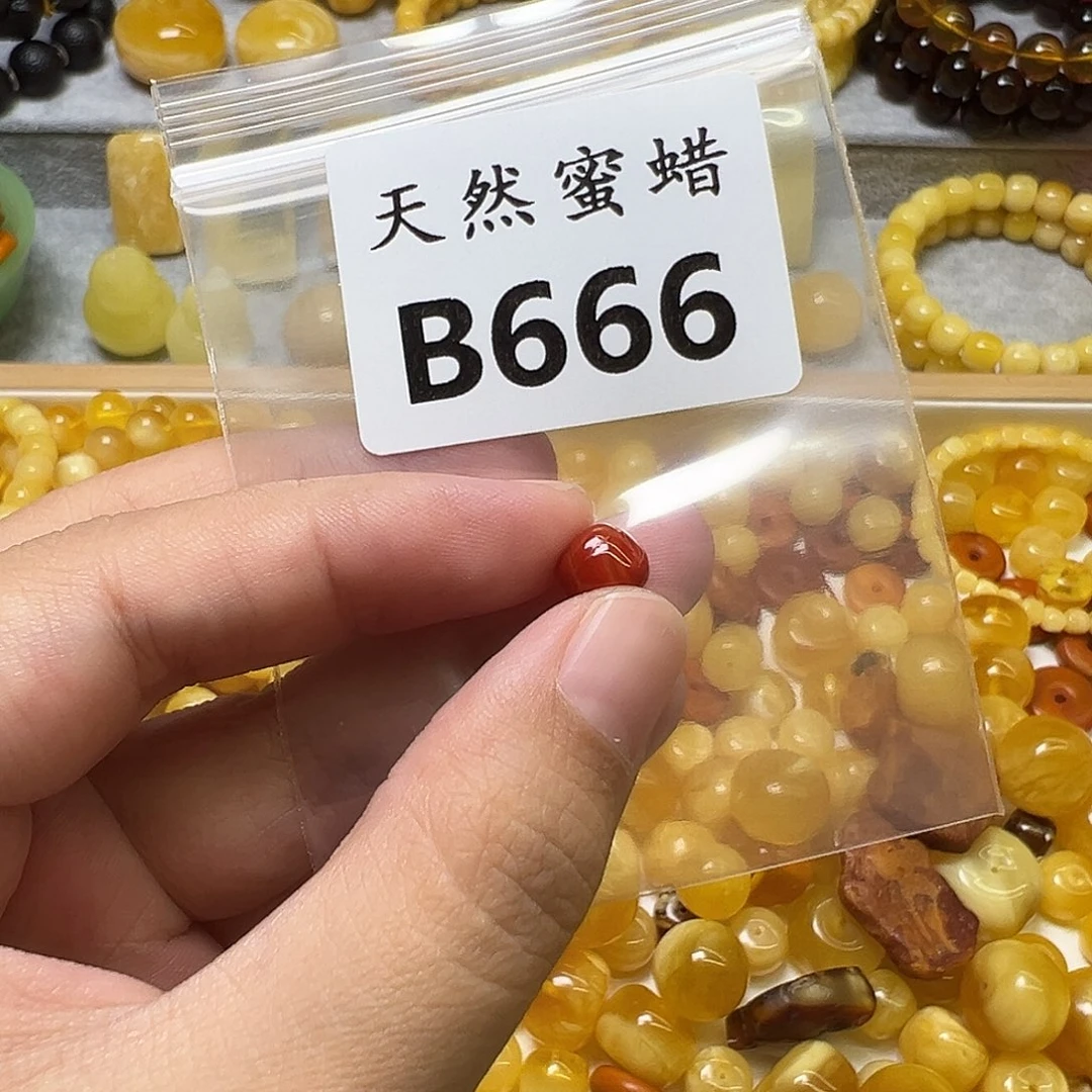 汐***许裸石蜜蜡未镶嵌666号，7+mm