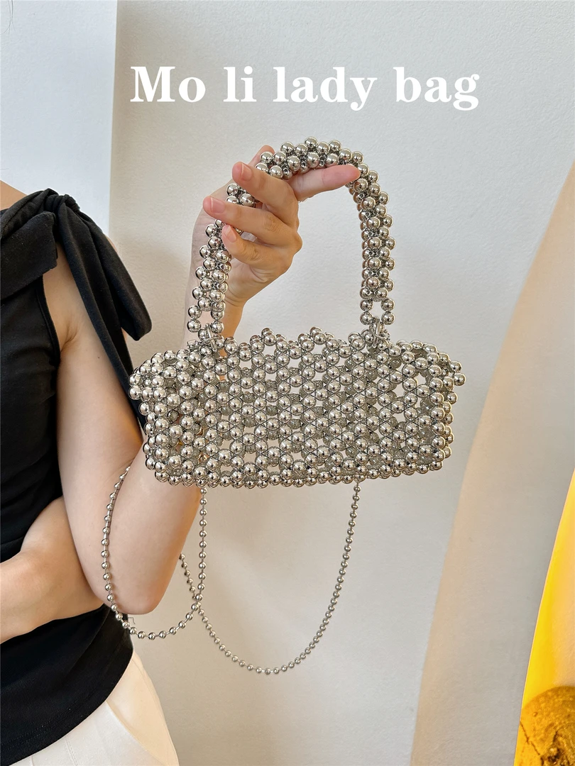 2025轻奢高级感串珠银色包包小众设计手提镂空包通勤单肩斜挎包
