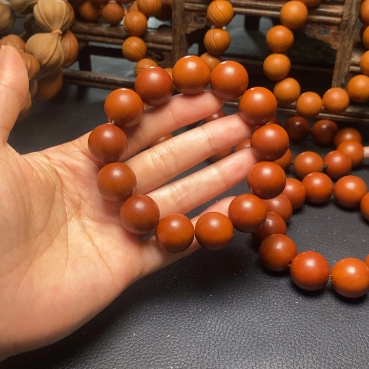 手串橄榄核1.7尺寸树王鸡血红光珠