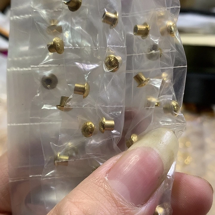 牛皮(革)铜合金驴家0.55有字上螺丝钉10个