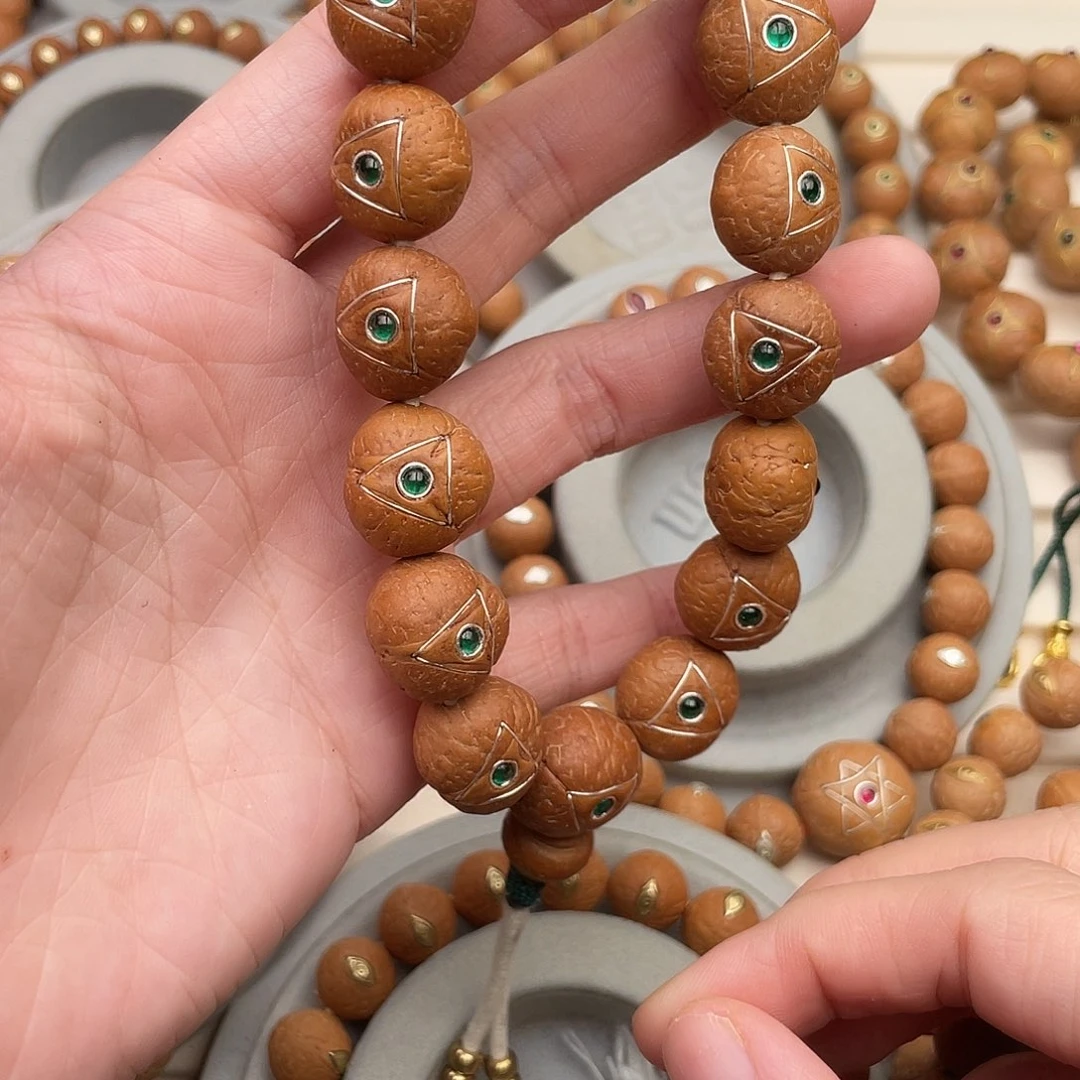 凤眼菩提吊坠紫金