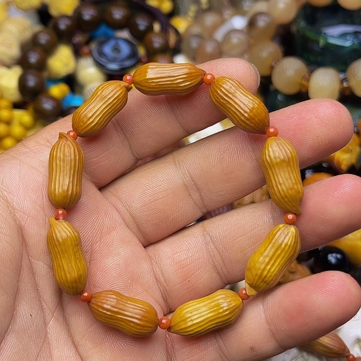 橄榄核吊坠凤****作8997890099990