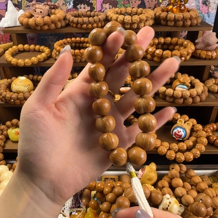 薄***莉猴头核桃吊坠大屁桃光面