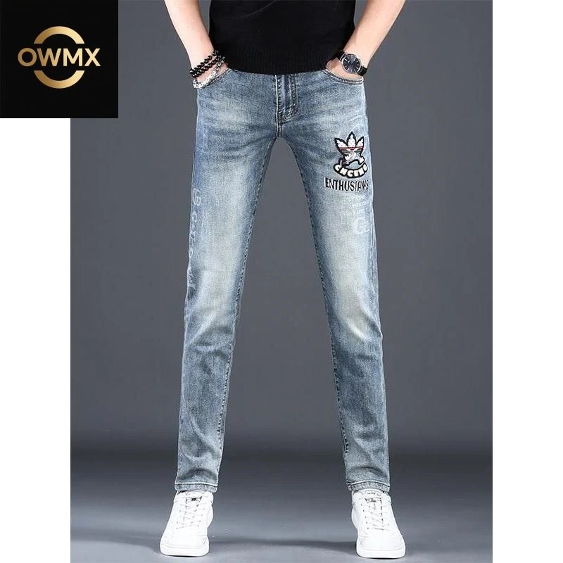 高端男款牛仔裤新款刺绣印花休闲弹力修身潮牌小脚春夏季潮流裤子