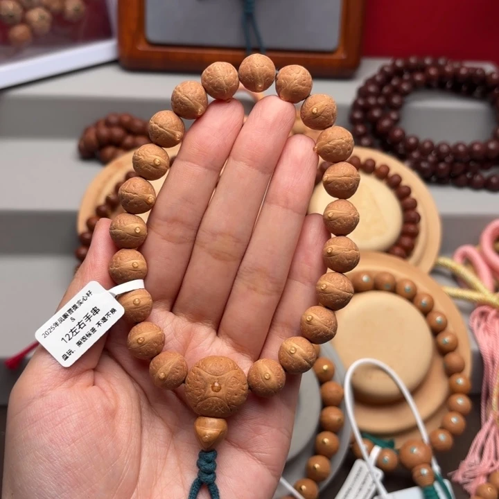 用***5凤眼菩提手串12左右实心籽手串