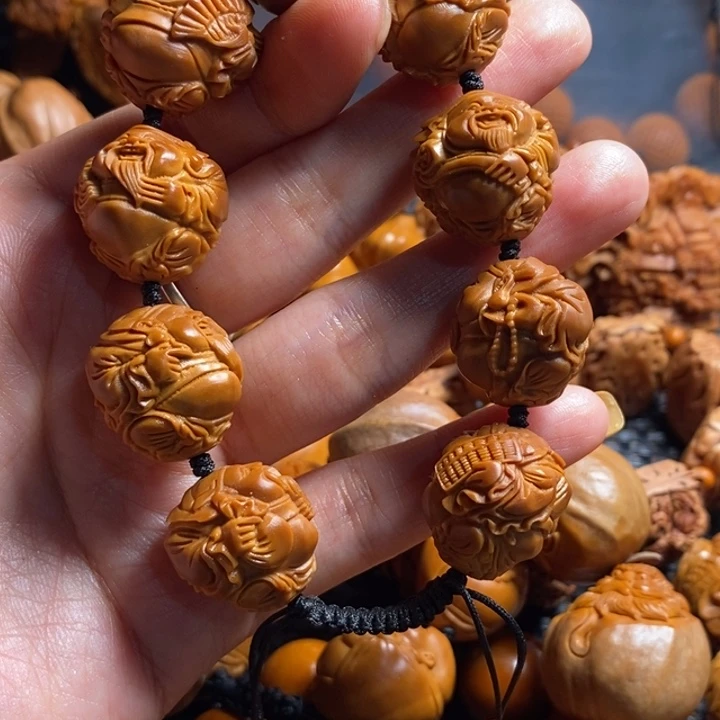 橄榄核吊坠八宝财神