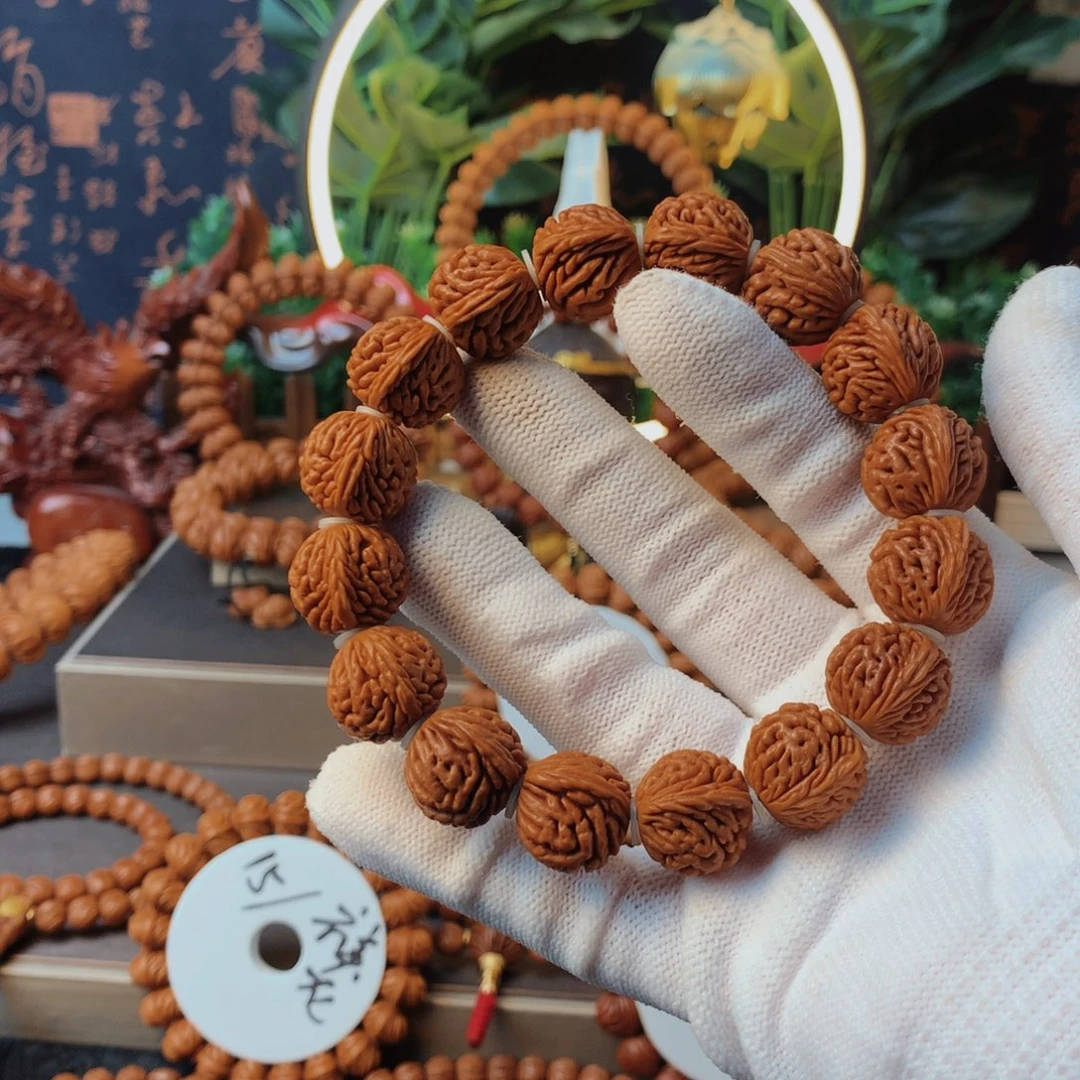 桃核吊坠开****?秦岭龙纹