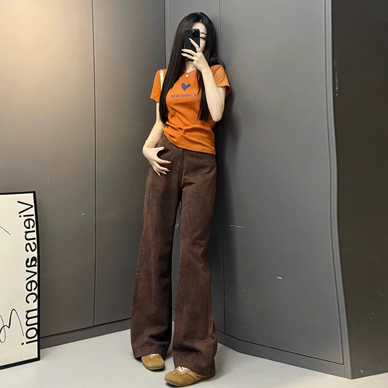 港风潮牌时尚套装女2025夏季修身设计感橙色上衣阔腿牛仔裤两件套