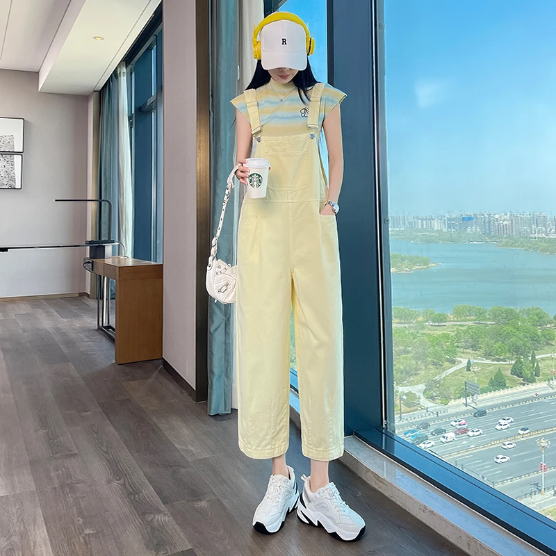 黄色哈伦牛仔背带裤女夏季2025年新款减龄显瘦宽松休闲连体萝卜裤