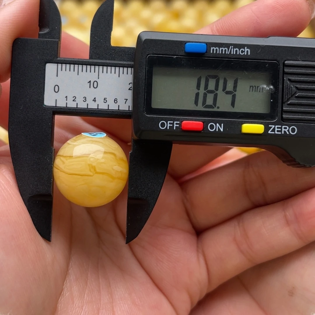 琥珀未镶嵌裸石蜜蜡圆珠笑