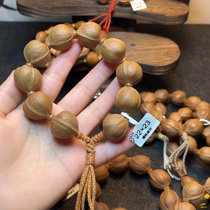 Y***己手串/手链橄榄核22.23梅林铁核