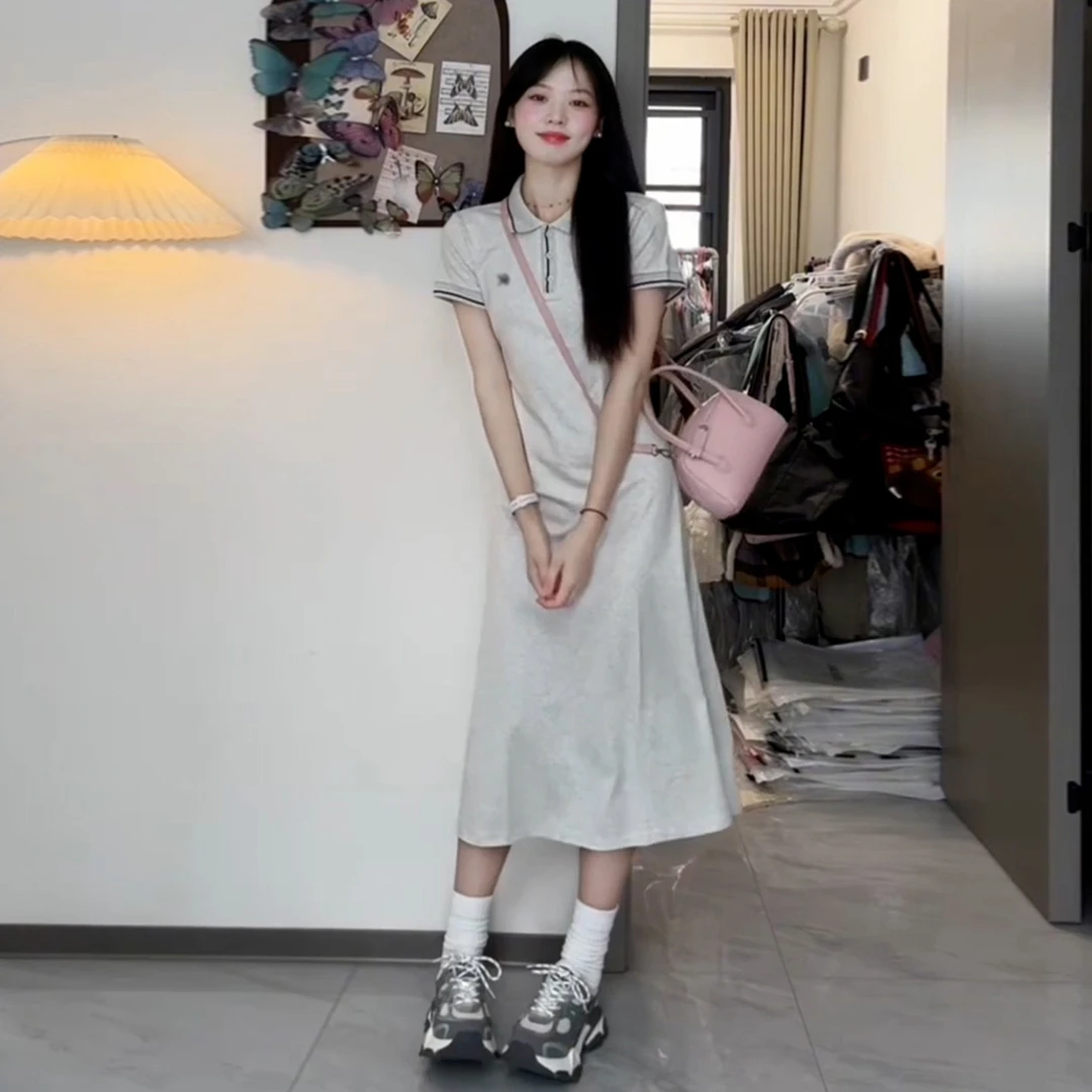 学院风polo领灰色连衣裙女夏季2025新款法式设计感收腰a字长裙子