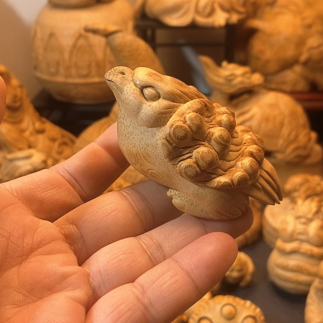 竹竹根雕报喜鸟一只