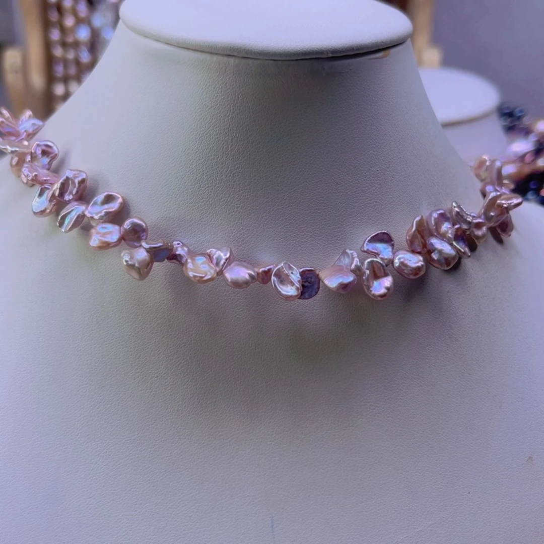 珍****淡水珍珠手绳合金