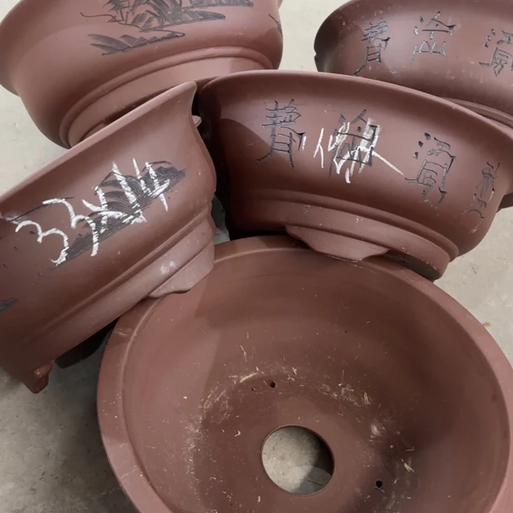 紫砂花盆100-5。        33-14