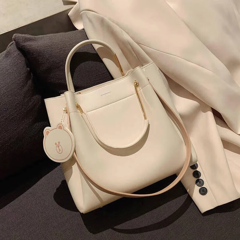 A231斜挎包甜美风肩包托特包拉链饺子包锁扣单根腋下