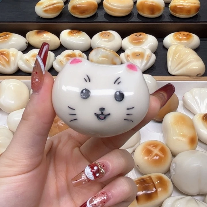 白玉菩提把件1.13.59象牙果把件猫头微瑕