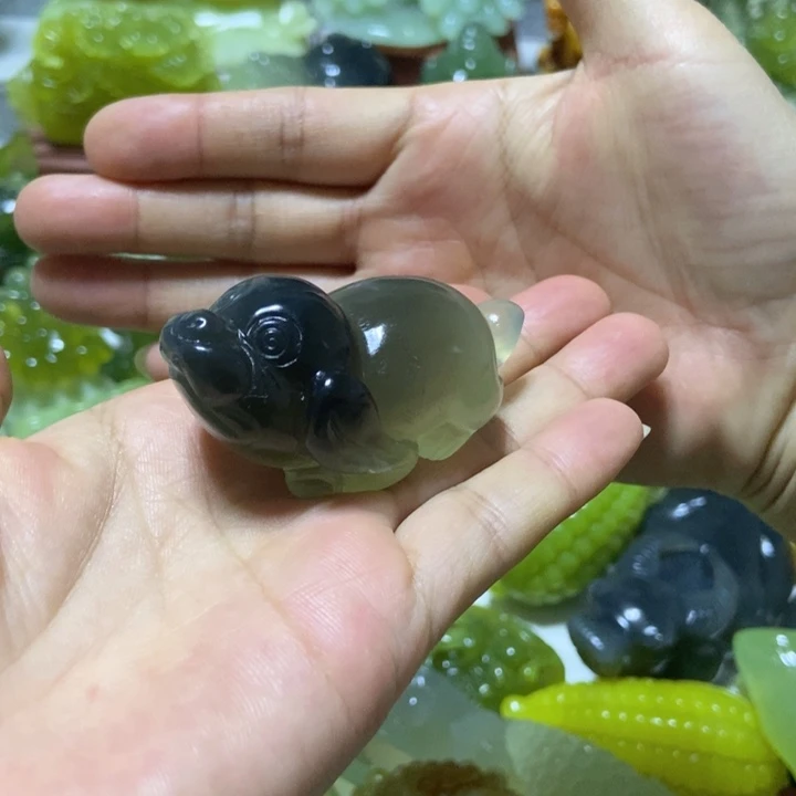 【闪购商品】未镶嵌蛇纹石玉把件拥**海