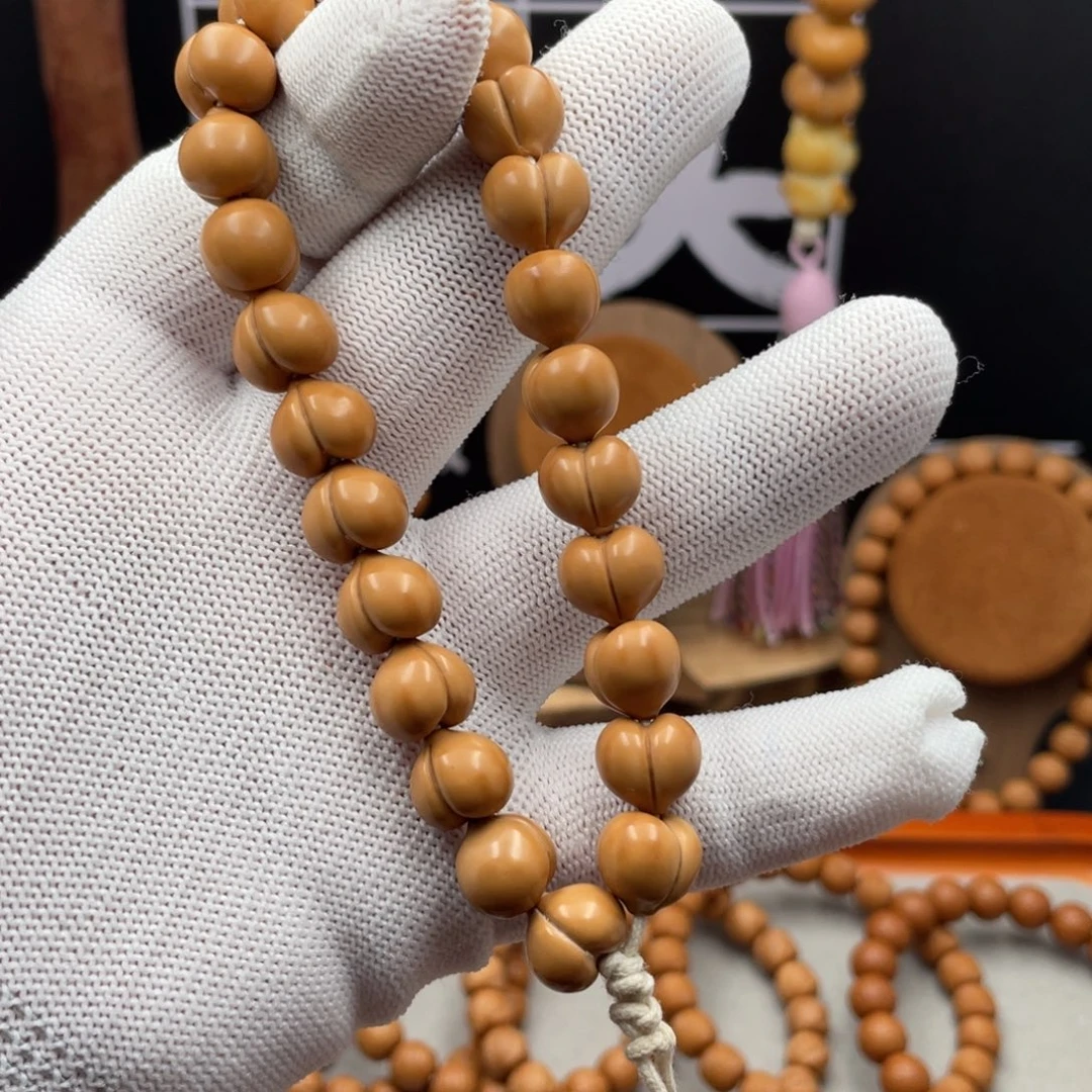 华***哥猴头核桃吊坠小屁桃手持