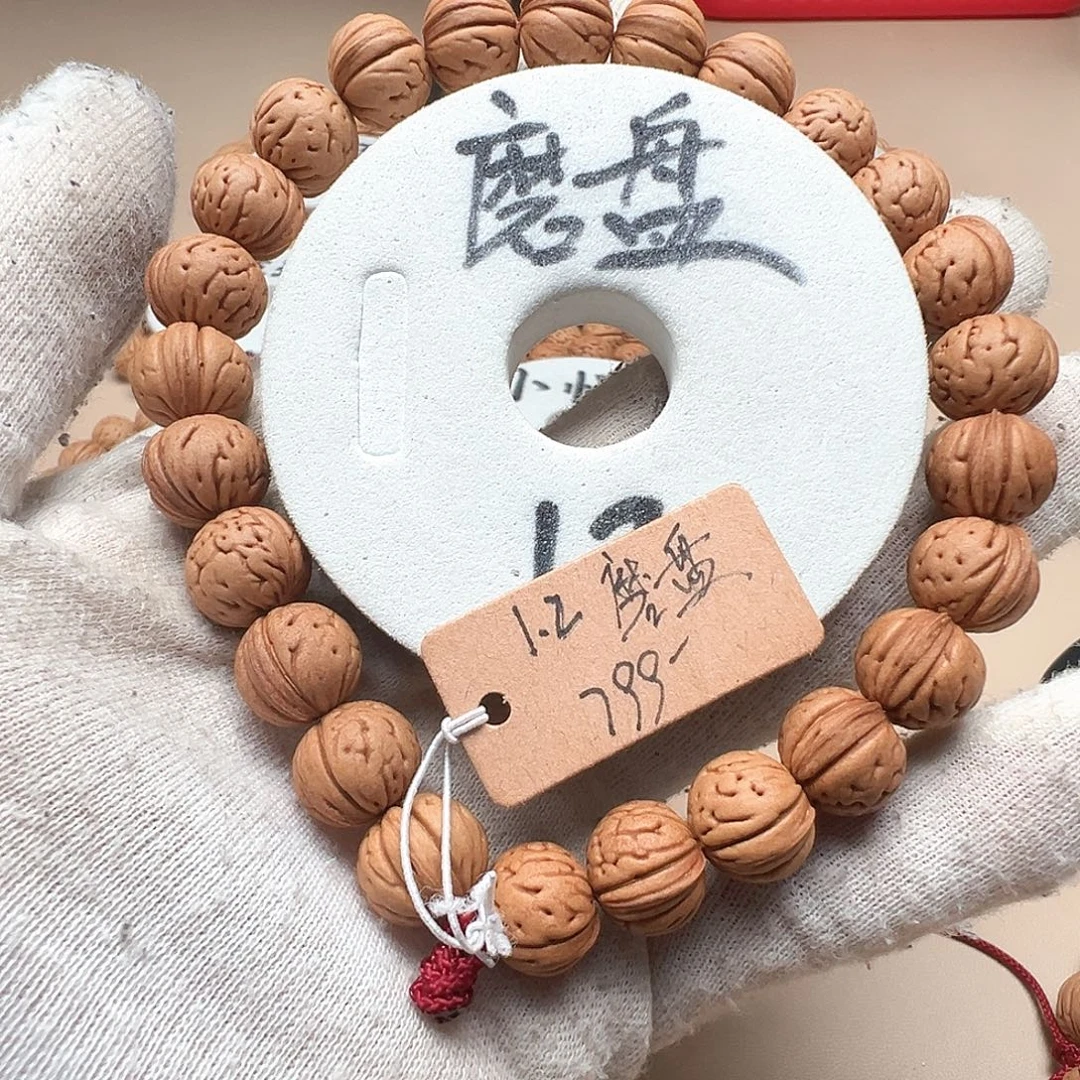 侯***爷手串桃核1.2红皮一道筋磨盘精品