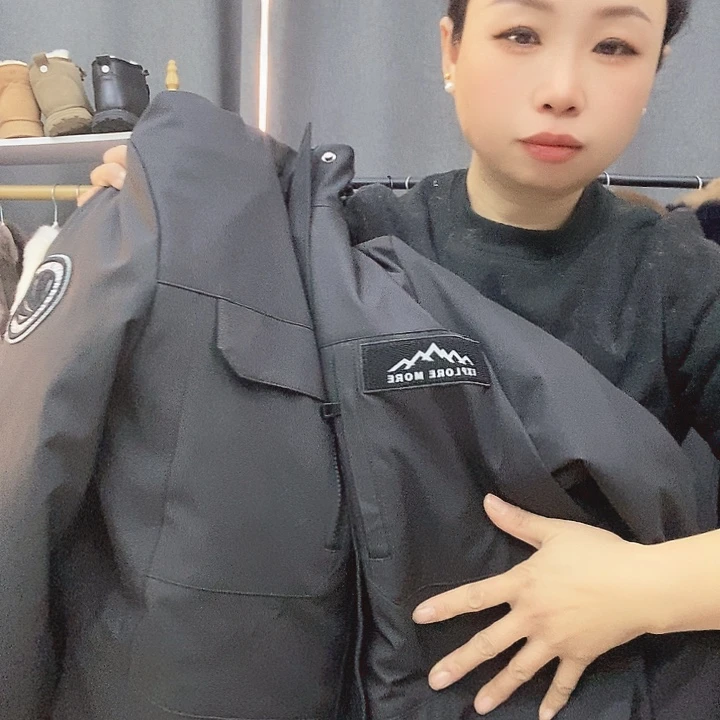 彭*梅黑色男款衣服外套