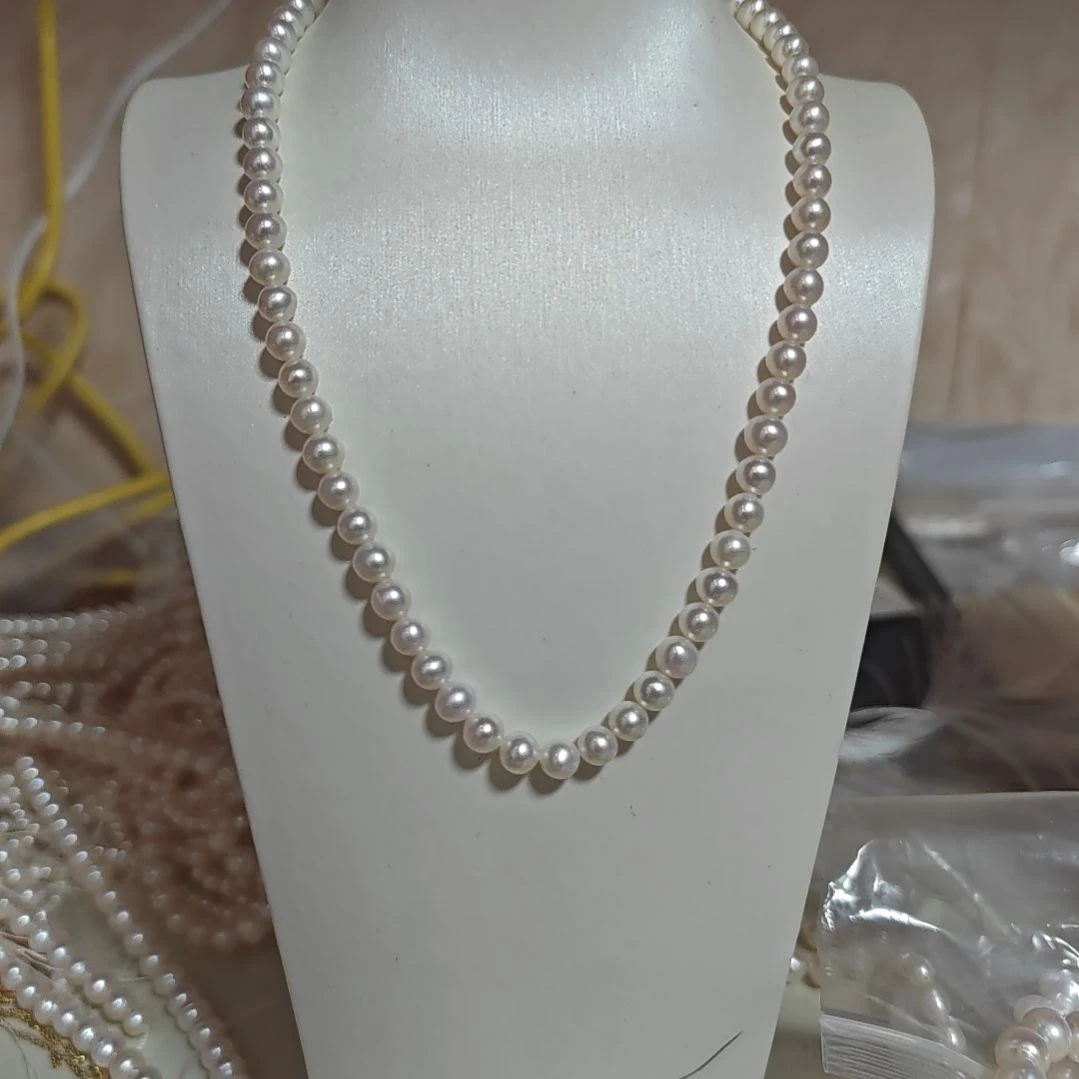 诸***意银S925镶嵌淡水珍珠耳钉