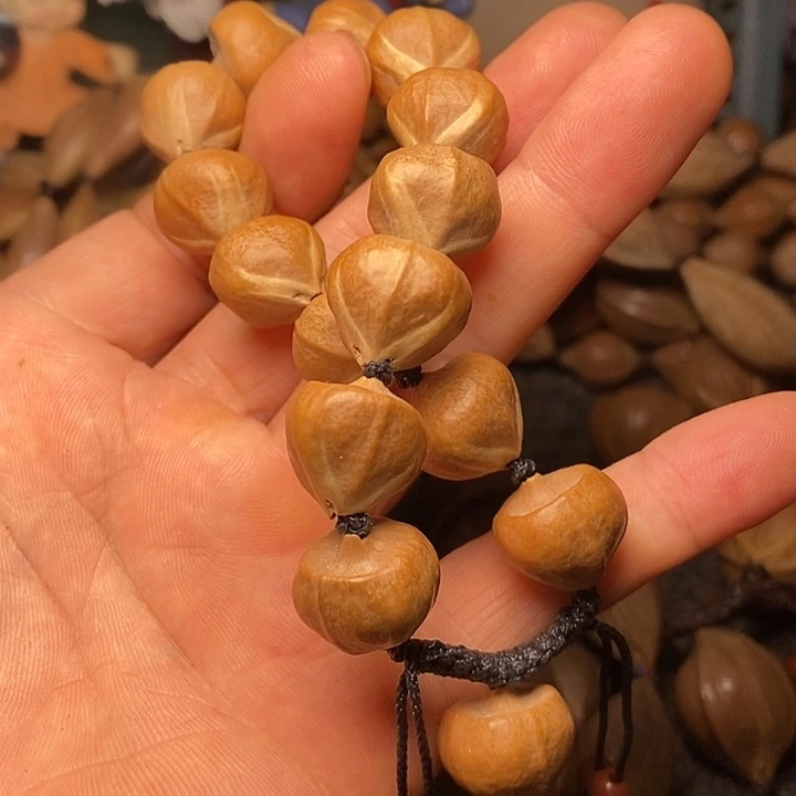 一***号橄榄核手串1.6蒜头55