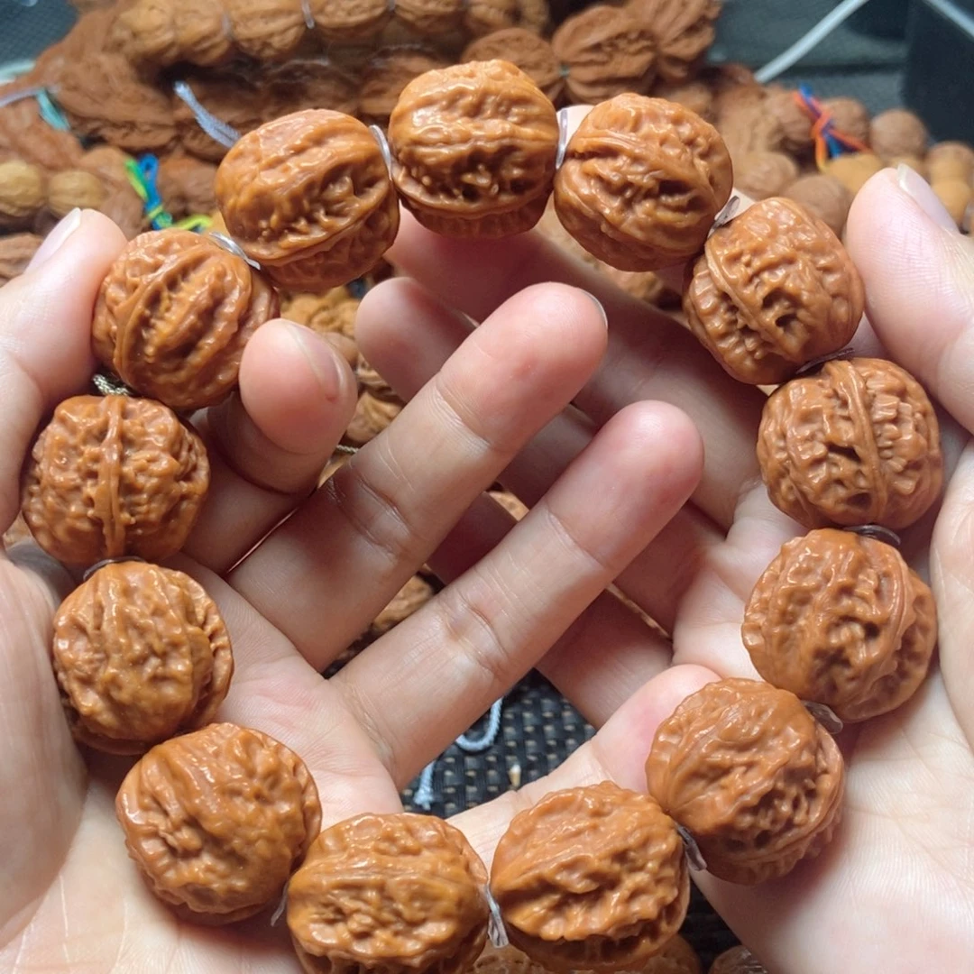 桃核吊坠粗筋手串