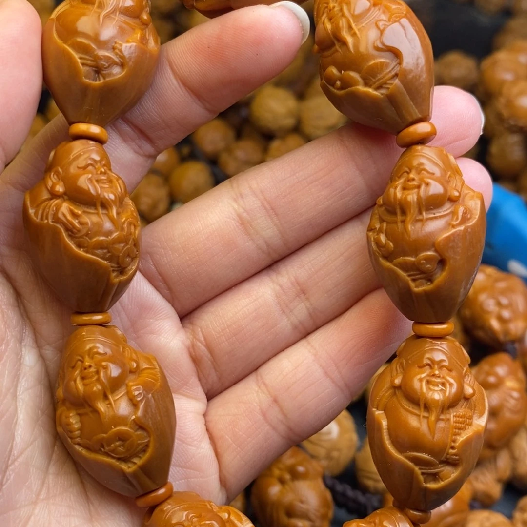 橄榄核吊坠包衣财神1.7+