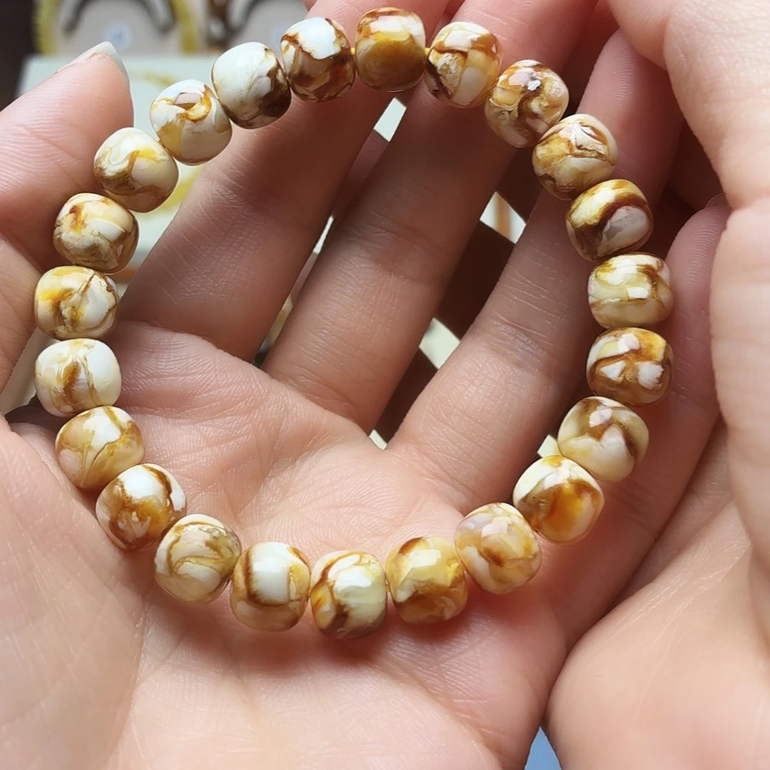 大***屁吊坠桃核沁色老型手串