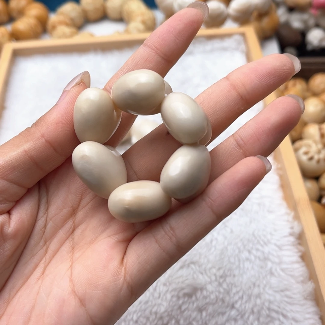 菩提根/象牙果把件微瑕爱心