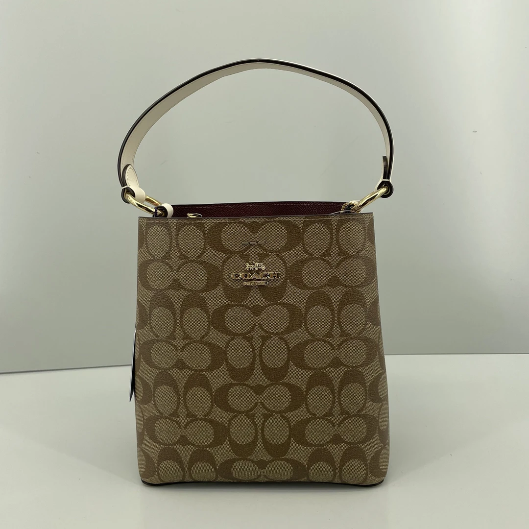 95新 COACH/蔻驰 town白拼老花斜挎水桶包 20*22*10cmE060409