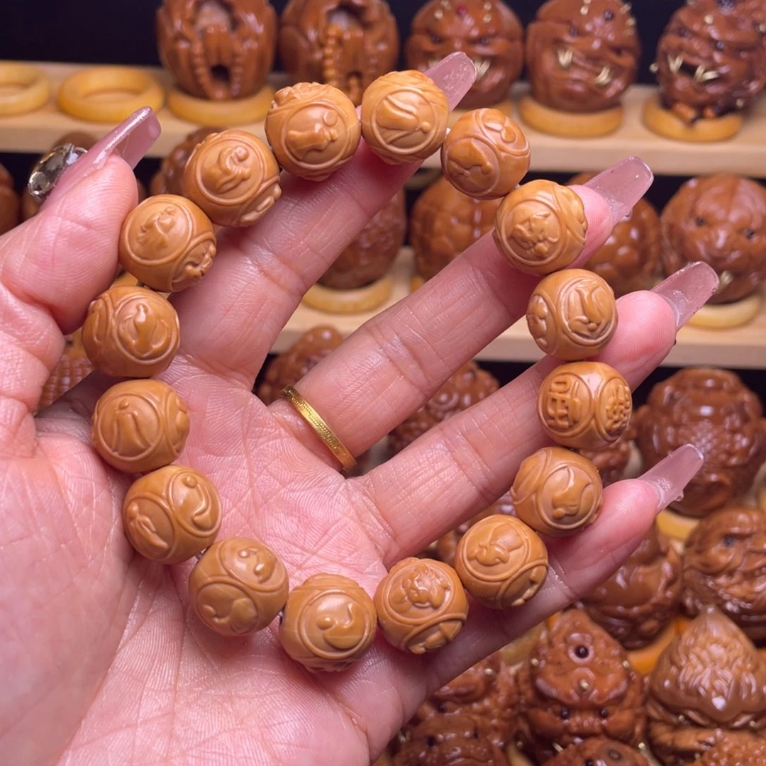 橄榄核把件往**风巴西大橄榄