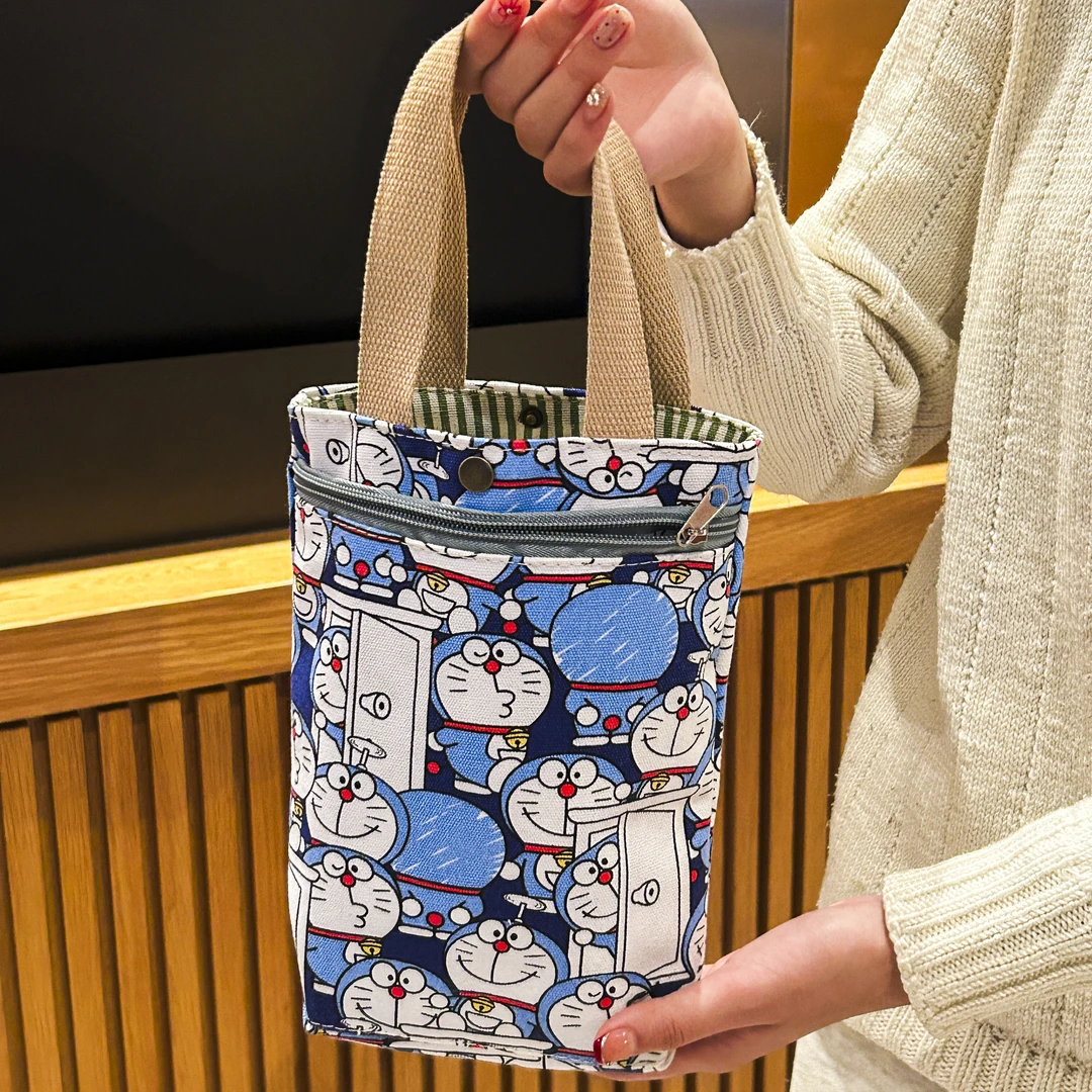 外出手拎小布包上班族装水杯雨伞袋子春夏新款帆布手提袋日系杯袋