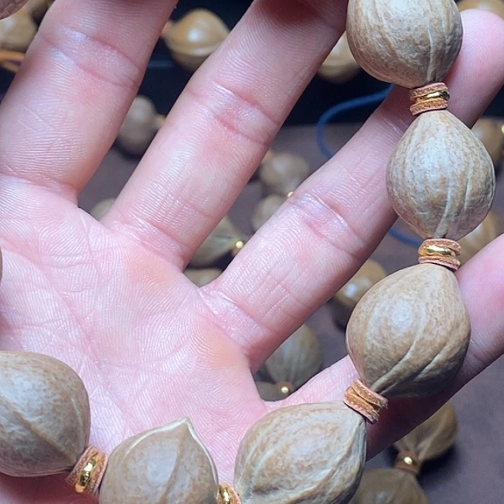 赵***成橄榄核手串/手链铁核