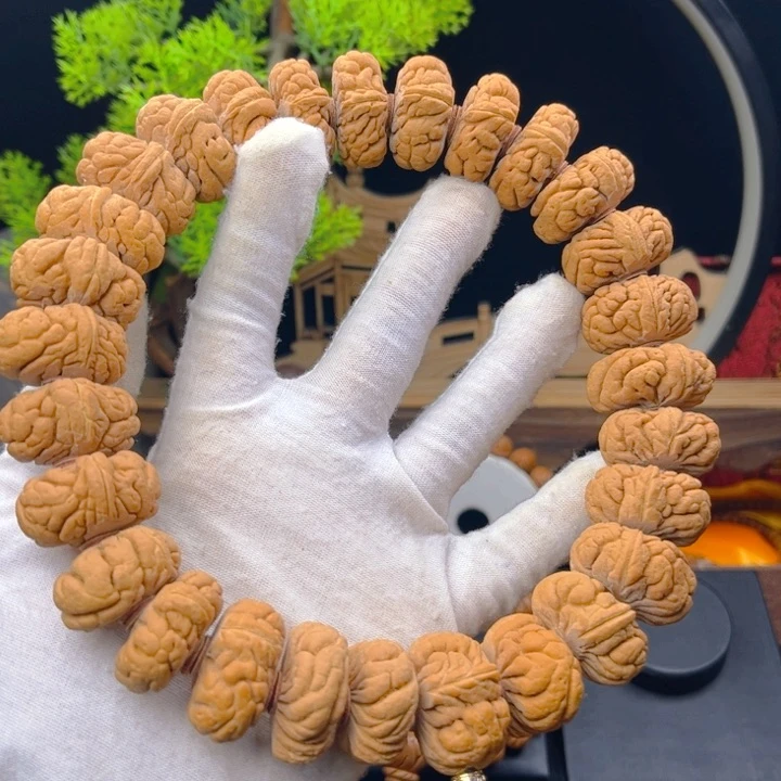 桃核吊坠骑****)野生桃核霸王龙手持