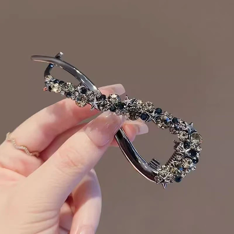 洋气新款轻奢繁星带钻金属扭扭夹气质弧形高级感发夹后脑勺发饰女