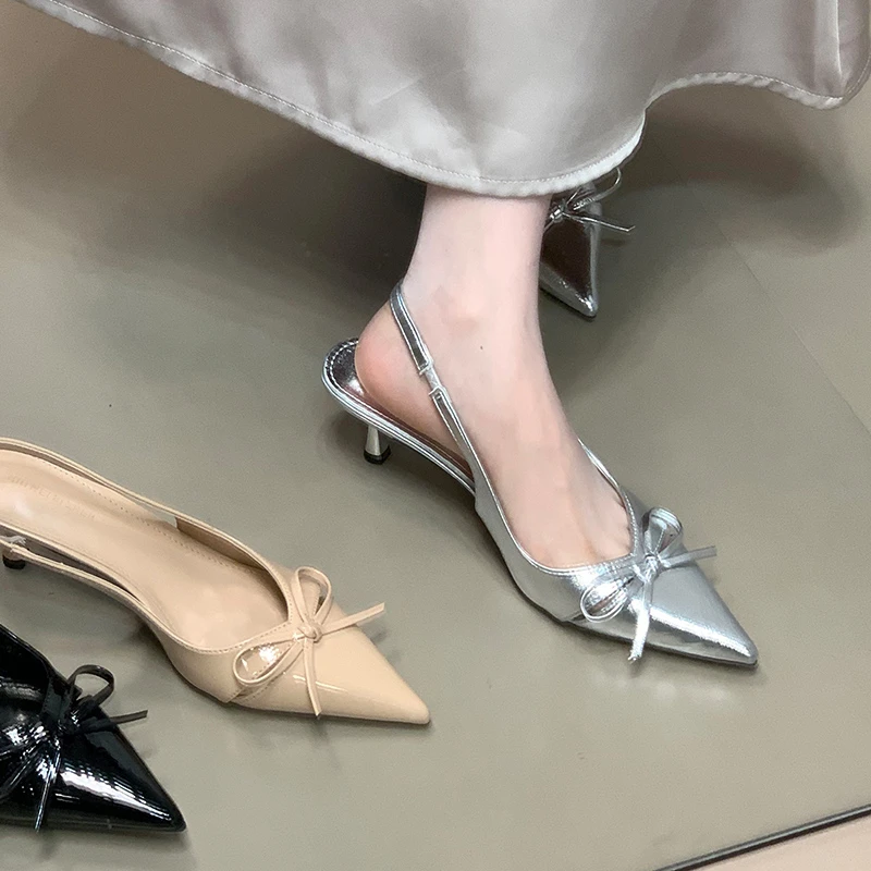 法式细跟银色尖头蝴蝶结高跟鞋后空夏季新款气质中跟包头凉鞋