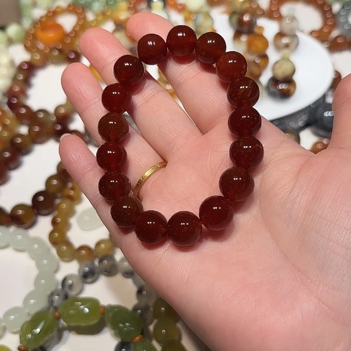 軒***夜未镶嵌蛇纹石玉手串