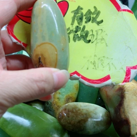 未镶嵌蛇纹石玉手把件
