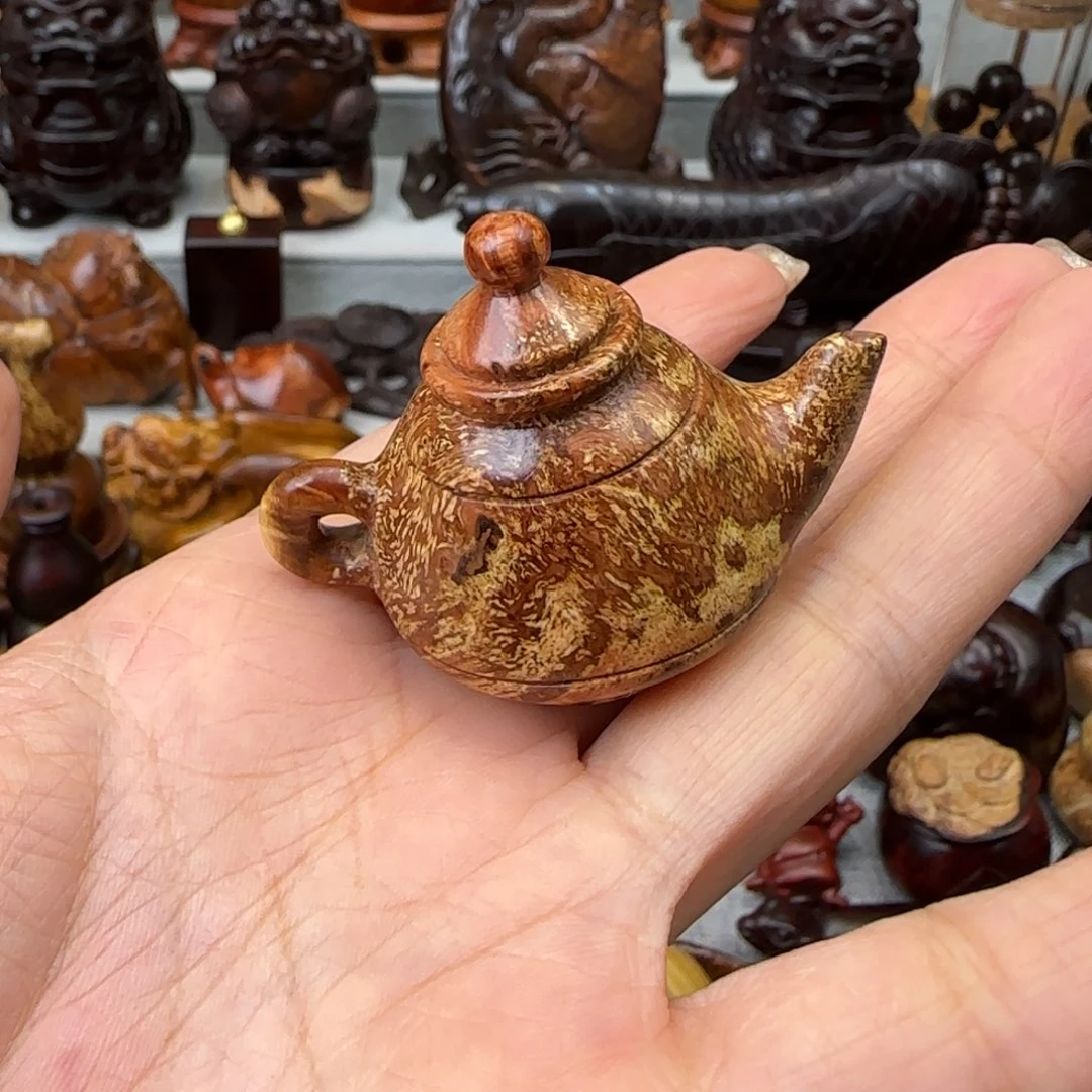 可***为木火琉璃雕刻壶把件