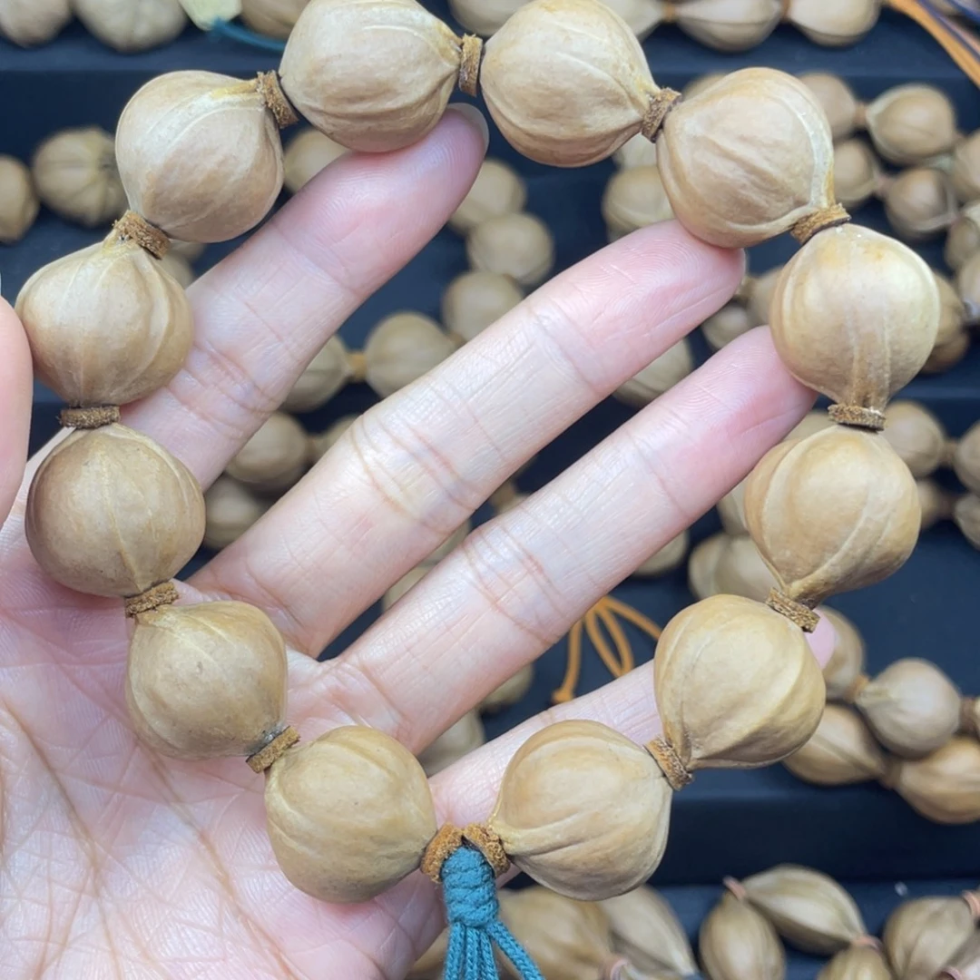 我***的001橄榄核三花20*22