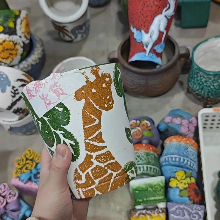 红陶吸水透气的白陶花盆