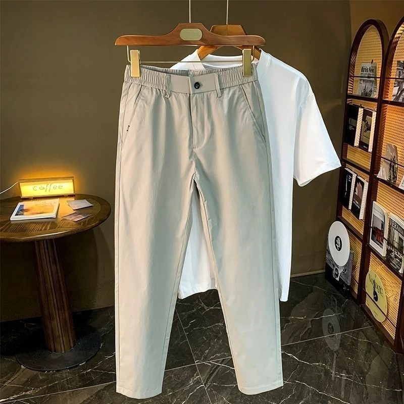 新款休闲九分裤男2025夏季薄款透气冰丝男裤修身弹力小脚男生裤子
