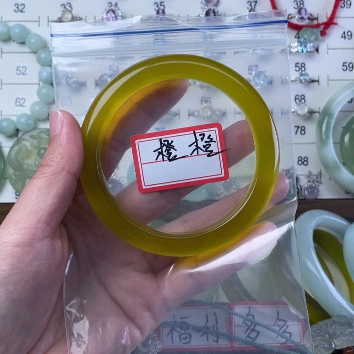 橙***ᐝ蛇纹石玉未镶嵌手镯