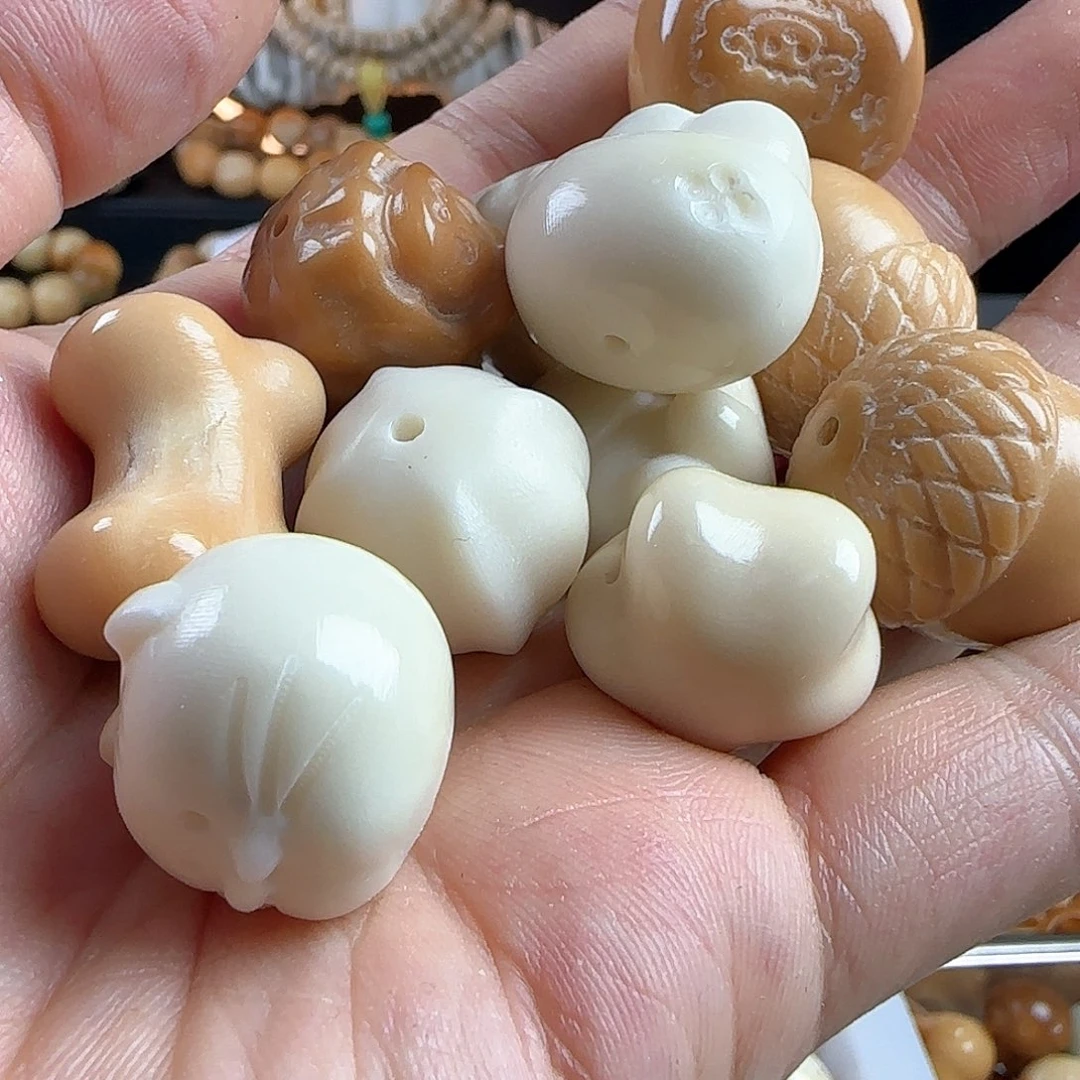 菩提根/象牙果手串瑕疵雕刻件2颗(自选2颗）有裂